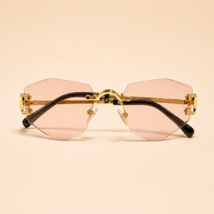Rimless geometric sunglasses from NeXova UK with blush pink lenses and gold-tone frame details