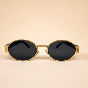 Front view of gold oval sunglasses with smoke black lenses and black side arms