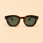 Round unisex sunglasses from NeXova UK with tortoiseshell frame and green lenses