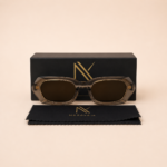 Angular rectangular unisex sunglasses with translucent taupe frame and brown lenses