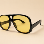 Oversized aviator unisex sunglasses from NeXova UK with glossy black frame and yellow tinted lenses