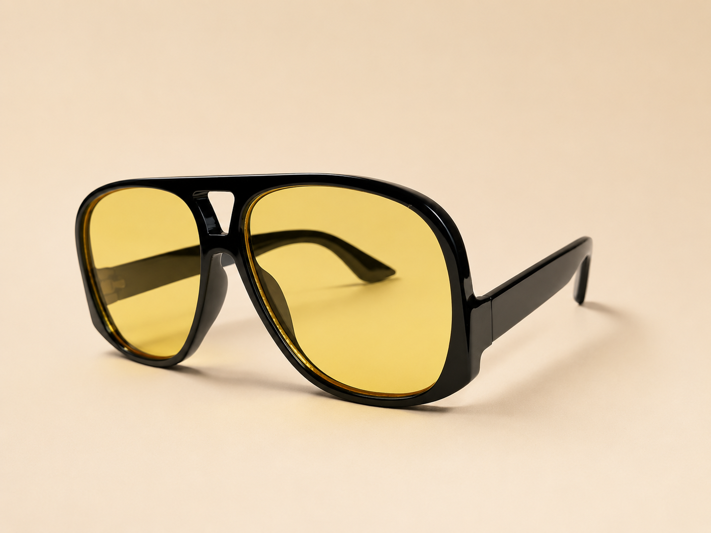 Oversized aviator unisex sunglasses from NeXova UK with glossy black frame and yellow tinted lenses