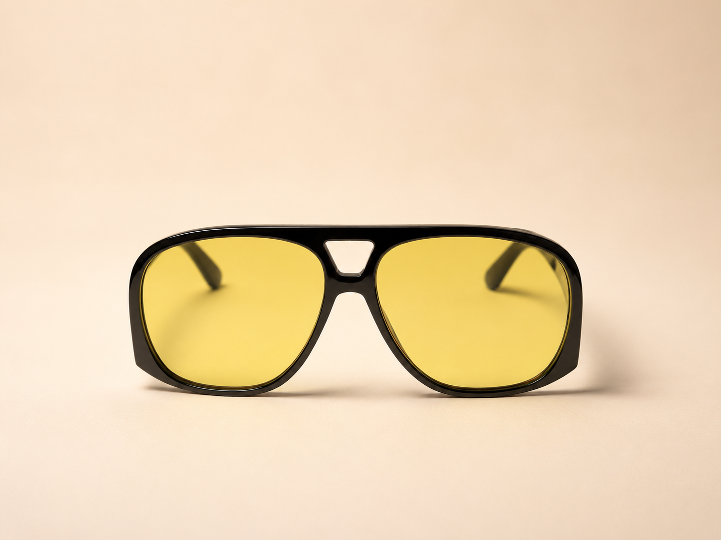 Oversized aviator unisex sunglasses from NeXova UK with glossy black frame and yellow tinted lenses